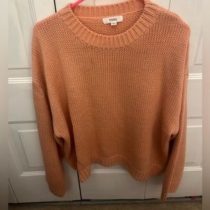 Pink knitted sweater